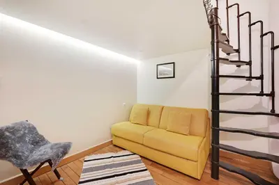 Coin salon dans l'établissement Charmant appartement proche de l Arc de Triomphe
