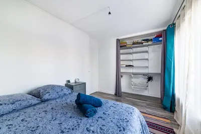 Un ou plusieurs lits dans un hébergement de l'établissement Cosy aux portes de Paris
