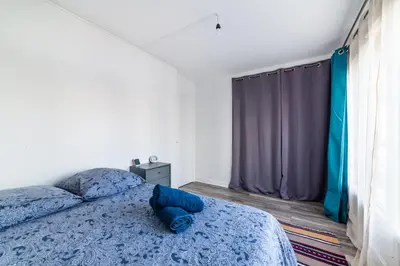 Un ou plusieurs lits dans un hébergement de l'établissement Cosy aux portes de Paris