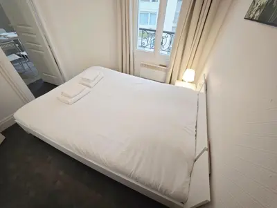 Un ou plusieurs lits dans un hébergement de l'établissement Beaugrenelle 1-Min Walk Elegant 2P Flat