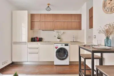 Cuisine ou kitchenette dans l'établissement Charming apartment in the heart of the Marais