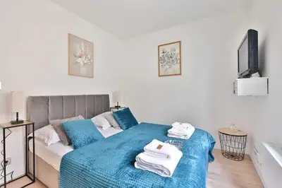 Un ou plusieurs lits dans un hébergement de l'établissement Charming apartment in the heart of the Marais