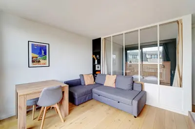 Coin salon dans l'établissement Charming apartment - 1BR- 2P- Nation
