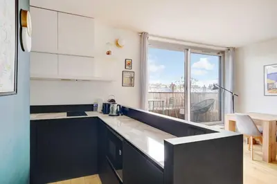 Cuisine ou kitchenette dans l'établissement Charming apartment - 1BR- 2P- Nation