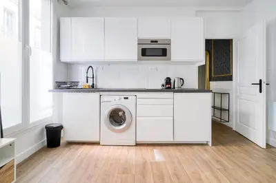 Cuisine ou kitchenette dans l'établissement Cozy Apartment for 4 people Montorgueil-Grands Boulevards
