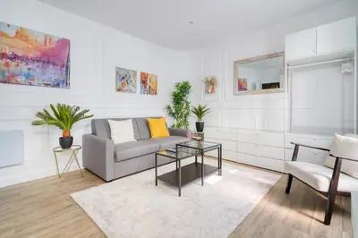 Coin salon dans l'établissement Cozy Apartment for 4 people Montorgueil-Grands Boulevards