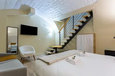 Un ou plusieurs lits dans un hébergement de l'établissement Designer Appartement - 6p