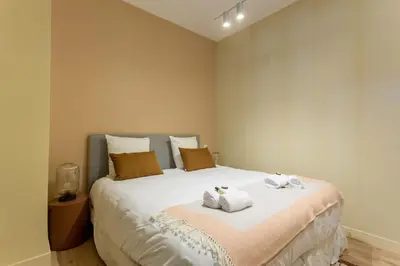 Un ou plusieurs lits dans un hébergement de l'établissement Designer Appartement - 6p