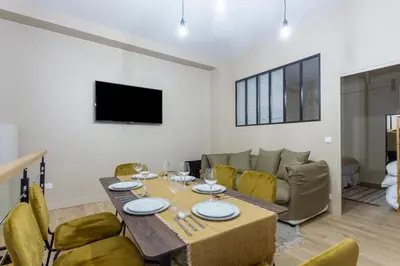 Télévision ou salle de divertissement dans l'établissement Designer Appartement - 6p
