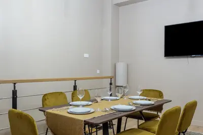 Télévision ou salle de divertissement dans l'établissement Designer Appartement - 6p