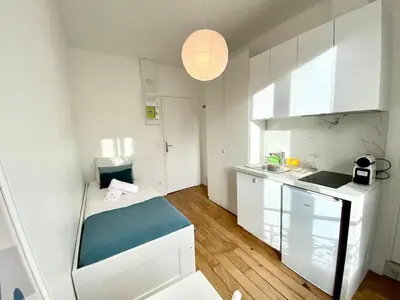 Cuisine ou kitchenette dans l'établissement 312 Suite Tour Eiffel -Cosy Apartment Paris Center
