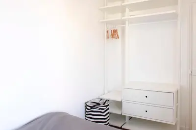 Un ou plusieurs lits dans un hébergement de l'établissement Bright apartment near Paris