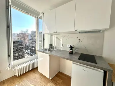 Cuisine ou kitchenette dans l'établissement 332 Suite Odyssee Cosy Apartment Paris Center