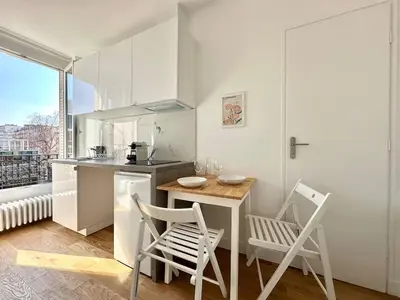 Cuisine ou kitchenette dans l'établissement 332 Suite Odyssee Cosy Apartment Paris Center