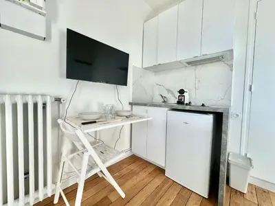 Cuisine ou kitchenette dans l'établissement New 354 Suite Paradis- Cosy Apartment Paris Center