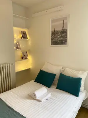 Un ou plusieurs lits dans un hébergement de l'établissement 362 Suite Dean - Cosy Apartment Paris Center
