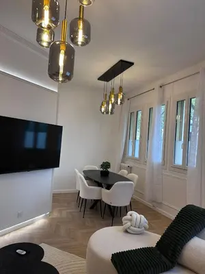 Télévision ou salle de divertissement dans l'établissement Charmant appartement Boulogne Billancourt