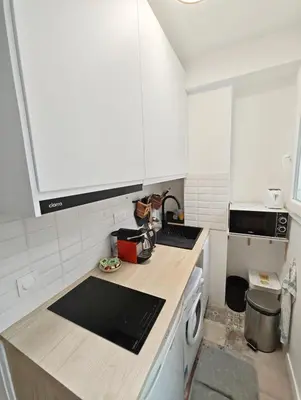 Cuisine ou kitchenette dans l'établissement Seine 2-Min & Notre Dame Cozy Studio