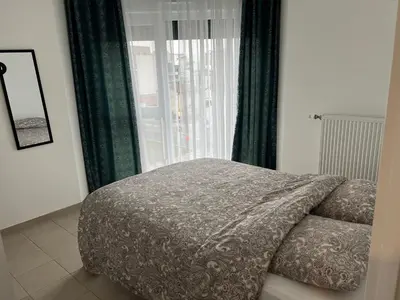 Un ou plusieurs lits dans un hébergement de l'établissement Spacious apartment