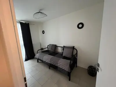 Un ou plusieurs lits dans un hébergement de l'établissement Spacious apartment