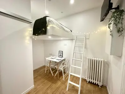 Télévision ou salle de divertissement dans l'établissement New 104 Suite Juliette - Cosy Apartment Paris Center