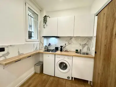 Cuisine ou kitchenette dans l'établissement New 104 Suite Juliette - Cosy Apartment Paris Center