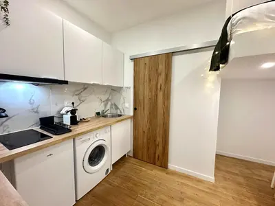 Cuisine ou kitchenette dans l'établissement New 104 Suite Juliette - Cosy Apartment Paris Center