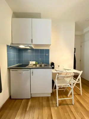 Cuisine ou kitchenette dans l'établissement New 116 Suite Deborah - Cosy Apartment Paris Center