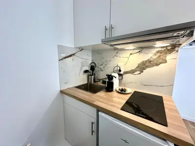 Cuisine ou kitchenette dans l'établissement New 141 Suite Marie - Cosy Apartment Paris Center