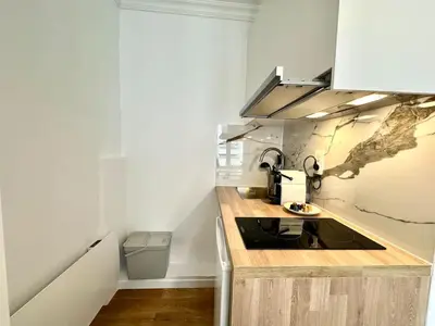 Cuisine ou kitchenette dans l'établissement New 141 Suite Marie - Cosy Apartment Paris Center