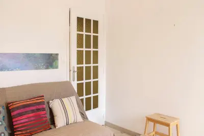 Coin salon dans l'établissement Pleasant bright apartment at the gates of Paris