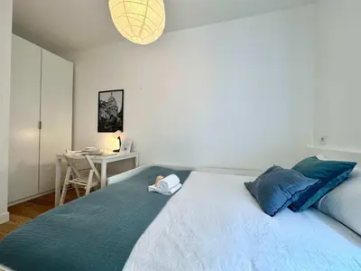 Un ou plusieurs lits dans un hébergement de l'établissement New 414 Suite Grant - Cosy Apartement Paris Center