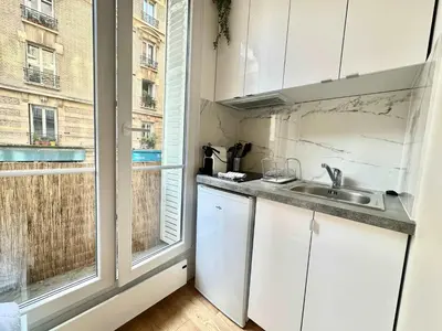 Cuisine ou kitchenette dans l'établissement New 414 Suite Grant - Cosy Apartement Paris Center