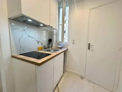 Cuisine ou kitchenette dans l'établissement New 431 Suite Dalida - Cosy Apartment Paris Center