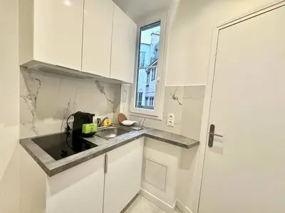 Cuisine ou kitchenette dans l'établissement New 441 Suite Matisse- Cosy Apartment Paris Center
