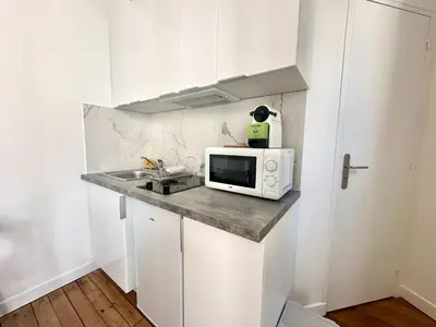 Cuisine ou kitchenette dans l'établissement New 442 Suite Edith - Cosy Apartment Paris Center