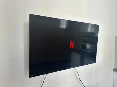 Télévision ou salle de divertissement dans l'établissement New 442 Suite Edith - Cosy Apartment Paris Center