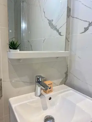 Salle de bains dans l'établissement New 451 Suite Monroe - Cosy Apartment Paris Center
