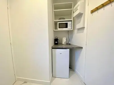 Cuisine ou kitchenette dans l'établissement New 451 Suite Monroe - Cosy Apartment Paris Center