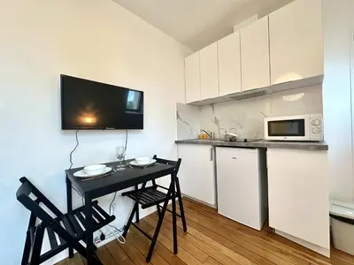 Cuisine ou kitchenette dans l'établissement New 462 Suite Olivier- Cosy Apartment Paris Center