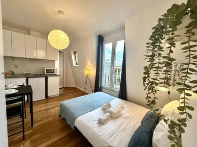 Cuisine ou kitchenette dans l'établissement New 462 Suite Olivier- Cosy Apartment Paris Center