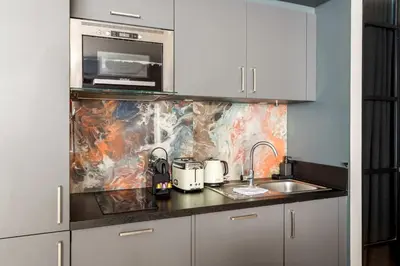 Cuisine ou kitchenette dans l'établissement Place des Vosges Apartment with Air Conditioning