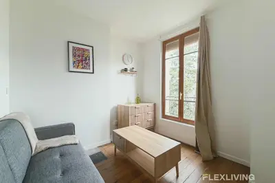 Coin salon dans l'établissement Charming - One-Bedroom Apartment in Paris 5th