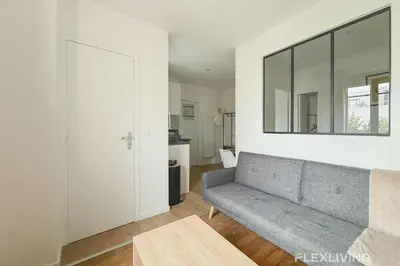 Coin salon dans l'établissement Charming - One-Bedroom Apartment in Paris 5th