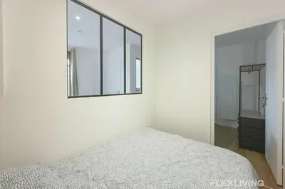 Un ou plusieurs lits dans un hébergement de l'établissement Charming - One-Bedroom Apartment in Paris 5th