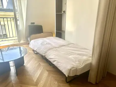 Un ou plusieurs lits dans un hébergement de l'établissement Chic Apartment in Paris Centre Next to Opéra & Louvre