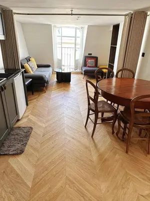 Coin salon dans l'établissement Chic Apartment in Paris Centre Next to Opéra & Louvre