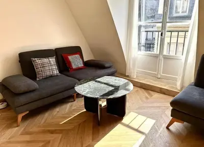 Coin salon dans l'établissement Chic Apartment in Paris Centre Next to Opéra & Louvre