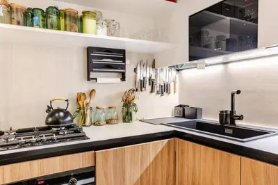 Cuisine ou kitchenette dans l'établissement Cosy - Ambiance galerie - Batignolles