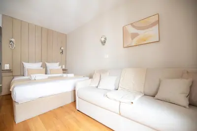 Un ou plusieurs lits dans un hébergement de l'établissement Charming Parisian Flat by Champs Elysées